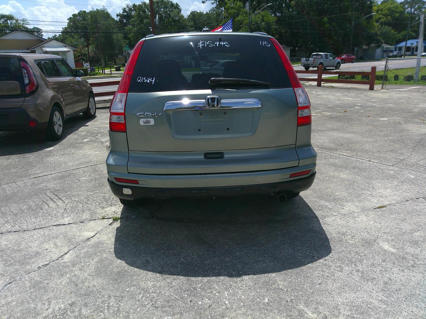 2010 GREEN HONDA CR-V EX-L (5J6RE3H79AL) , located at 10405 Abercorn Street, Savannah, GA, 31419, (912) 921-8965, 31.988262, -81.131760 - Photo#3